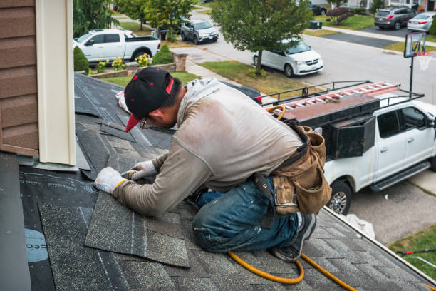 Professional Flat Roof Repair technician working in Nome, TX